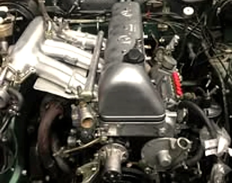 An engine bay buttoned back together after a rebuild