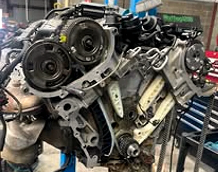 An engine out of the car for a rebuild